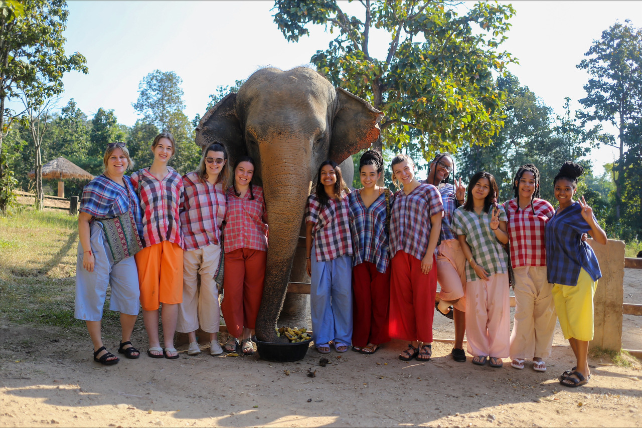 LSU students pose with an elephant during the 2024 Global Leadership in Thailand program