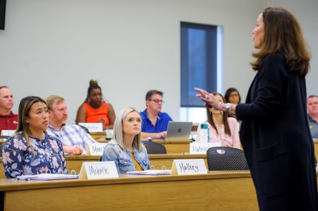 Students listen in classroom 