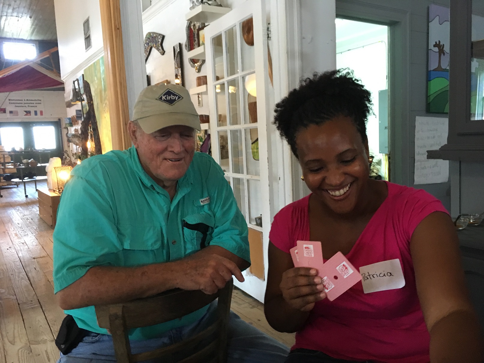 Exchange participants playing a cajun card game