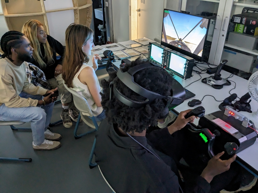 students work on virtual simulation equipment