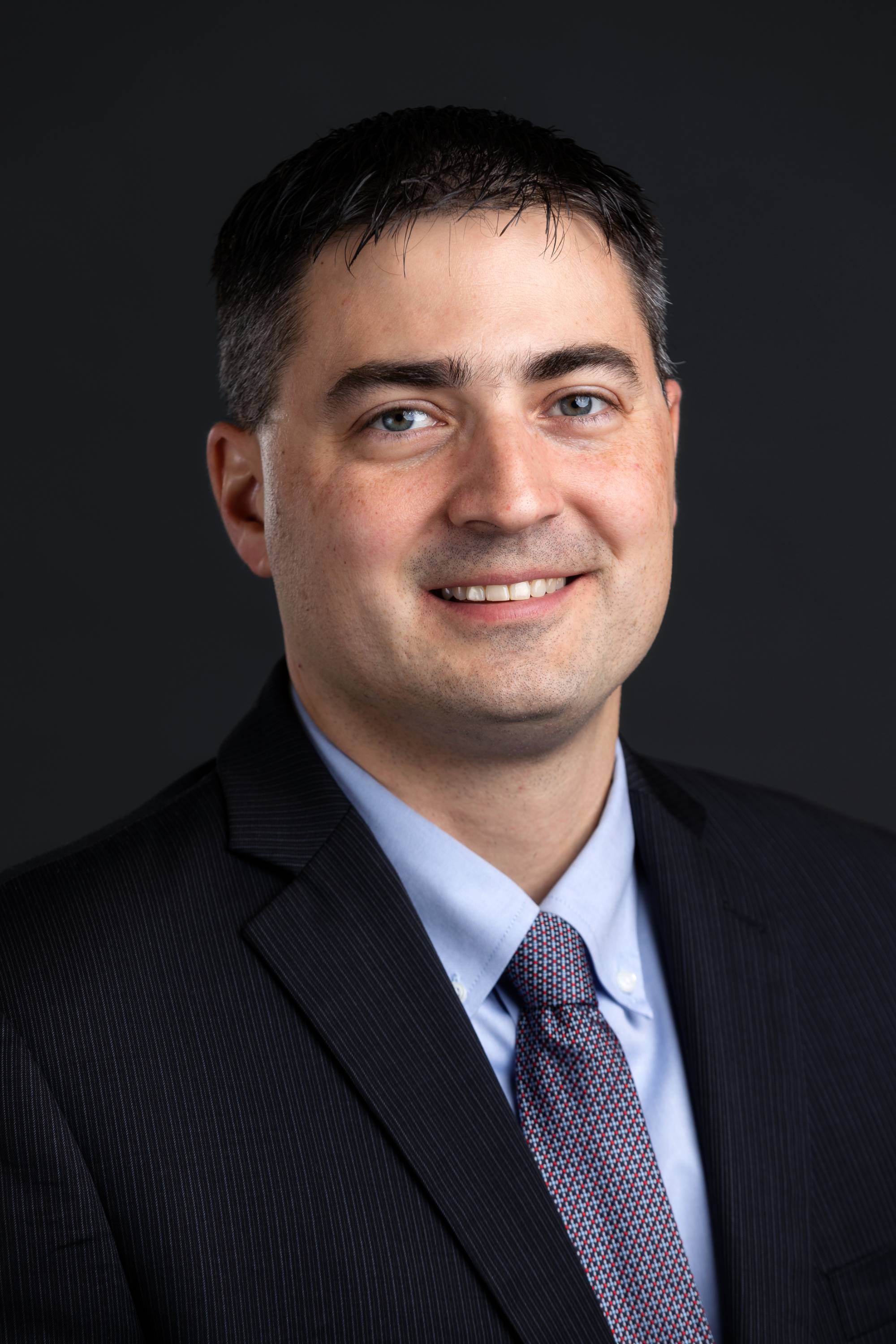 headshot of  Michael Henderson